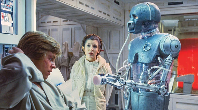 Medical droid assisting surgeon
